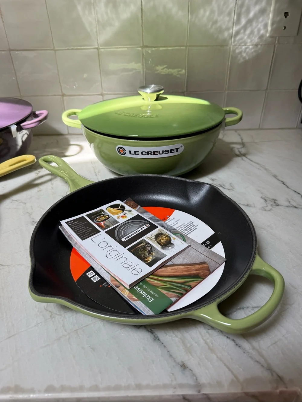 Le Creuset Purple, Yellow, and Green Cast Iron Cookware Set